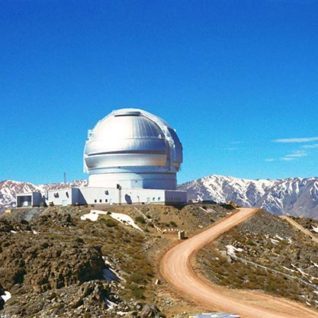Cerro Tololo Inter-American Observatory with the silver dome which is the Blanco 4-meter telescope